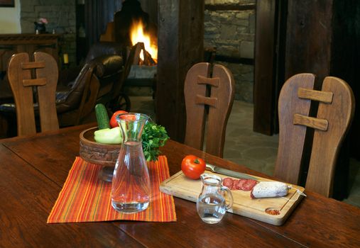 Food - brandy, sausage, and fruits on wooden table