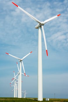 Nature conservation wind power generators, large turbines in a green field