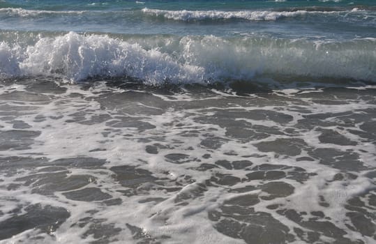 bright ocean water wave as a background or texture