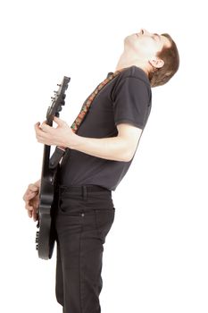 young man with a guitar on an isolated white background
