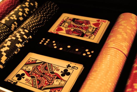 Playing cards, poker chips and dices.