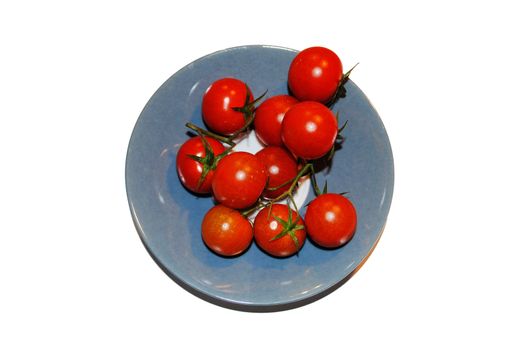 A plate of red tomatos.