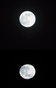 Moon in black sky with reflection in the water