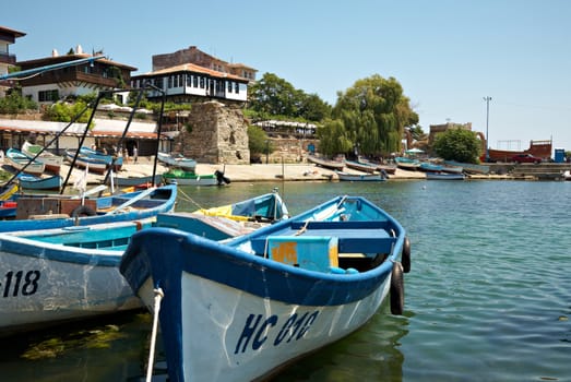 Ancient Nessebar town view with boats