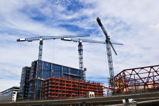 Building cranes in action in Stockholm
