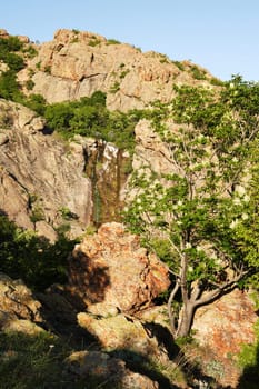 Scene with a waterfall in the Sinite kamani nature park