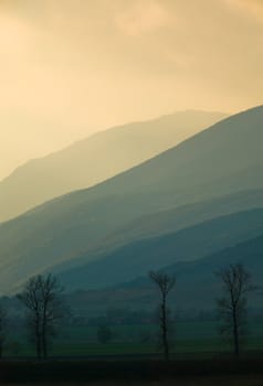 Mountain elevations and hills at sunset time