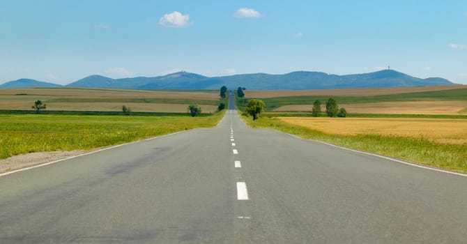 Scene with a road and mountains