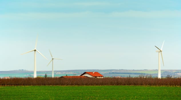 Electricity windmills around a country house