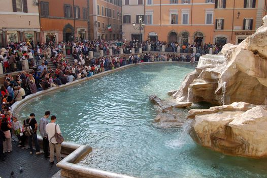 ROME, ITALY - NOVEMBER 11: Tourist in Rome visit Trevi fountain (Fontana di Trevi) . Editorial. November 11, 2006 in Rome, Italy.