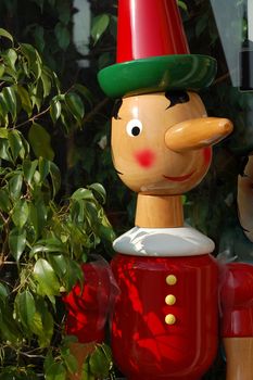 Pinocchio - famous italian wooden puppet with long nose