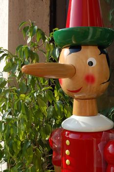 Pinocchio - famous italian wooden puppet with long nose
