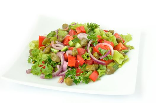 Vegetable salad with capers and herbs close	