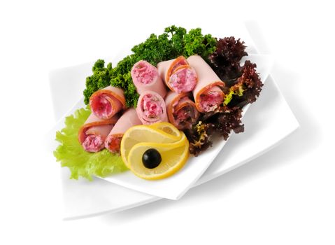 Ham roll with horseradish sauce with herbs and cheese isolated