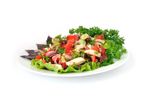 Salad with beans, tomatoes and chicken breast, lettuce, onions in mustard sauce with garlic