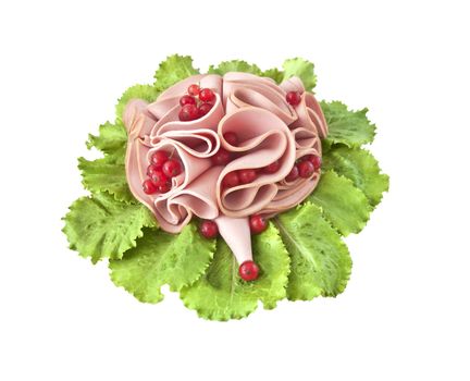 Sliced sausage, decorated in the form of a hedgehog on lettuce