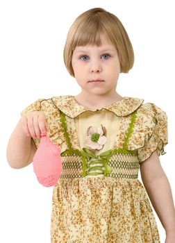 Sad very little girl with blow off pink balloon