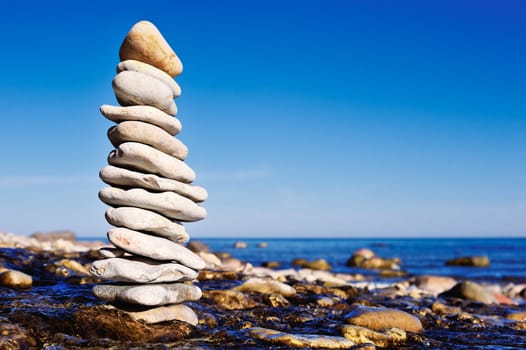 High stack of gravel on the coast