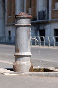 Typical rome fountain. Detail - Classic roman free water public fountain. Rome Italy