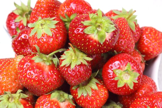 Shot of fresh red strawberries on white background