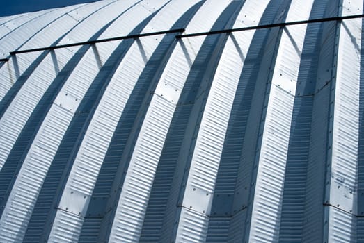 Close up of metal roof with light and shadow