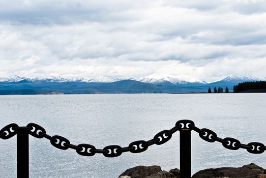 Chain links at lakeside landscape in Yellowstone Park USA