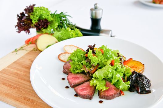 steak grilled to perfection and served with vegetables