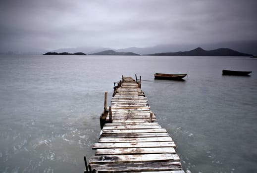 pier and boat, low saturation