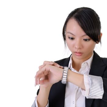 Business woman looking watch with surprised expression, closeup portrait with white copyspace.