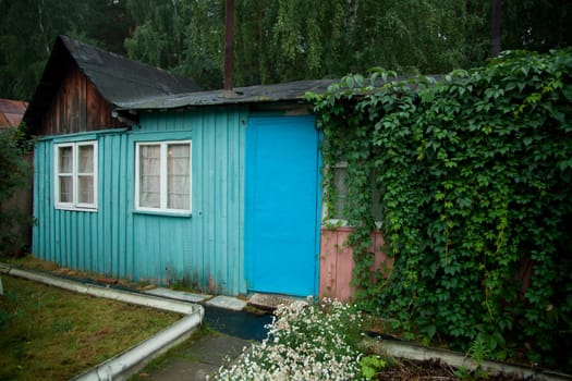 Little old wooden house. Picture for property insurance, construction, wood protection
