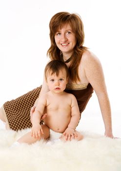 Mother with one year daughter together isolated on white