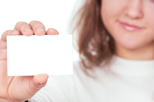 Young beautiful businesswoman holding empty white board