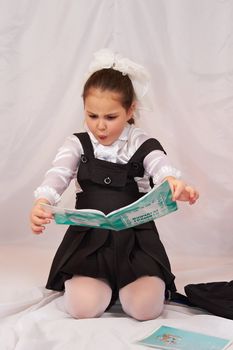 A child reading a book.