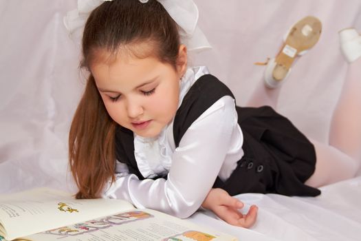 A child reading a book.