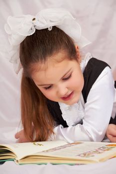 A child reading a book.