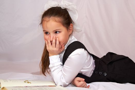 A child reading a book.