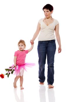Mother and daughter walking together looking aside isolated