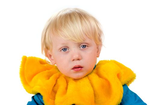 Portrait of Sad child wearing huge yellow clown collar isolated on white