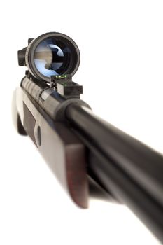 Image of a rifle with optical sight on a white background