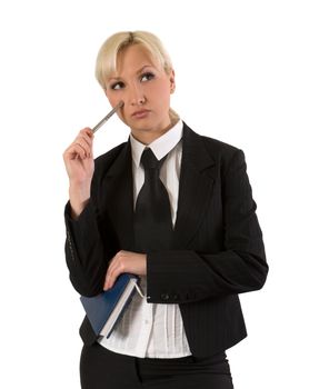 Thoughtful young woman with organizer and a pen against white background.