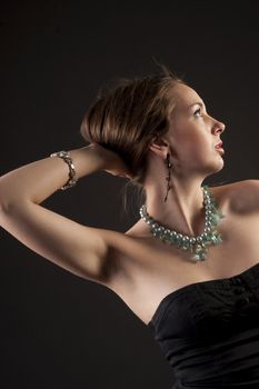 Girl in classic dress posing to the camera