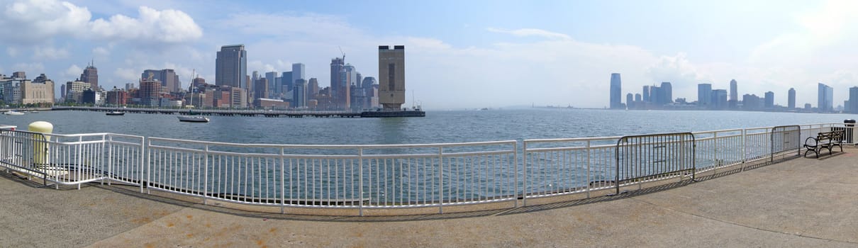 manhattan panorama, holland tunnel ventilation in the middle, jersey city in distance