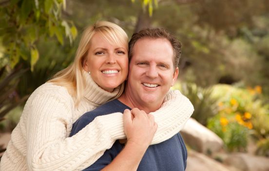 Happy Attractive Adult Couple Portrait in the Park.