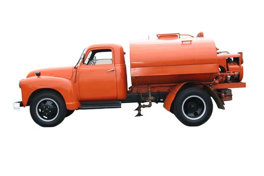 This is a picture on a late 1940s, orange city/county road maintenance tanker truck that is used for spraying oil down on dirt roads to keep the dust down.