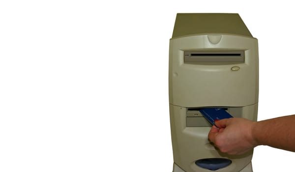 This is a picture of a woman putting a credit card into the floppy drive of a computer. Isolated on white, room on left side for writing.