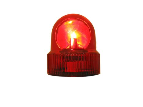 This is a flashing red emergency light that is isolated on white.