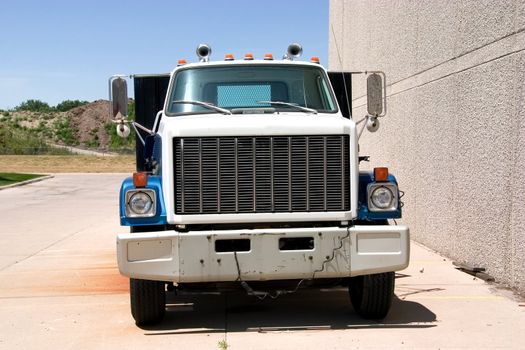 This is the front of a mid 1980's flat bed truck.