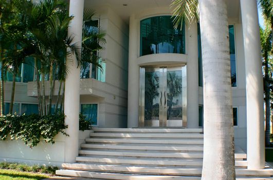 This is a picture of a front entranceway to a home in sunny Florida.