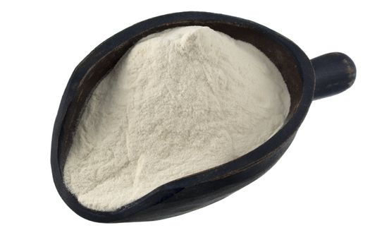 potato flour or other white powder on a rustic, wooden scoop, isolated