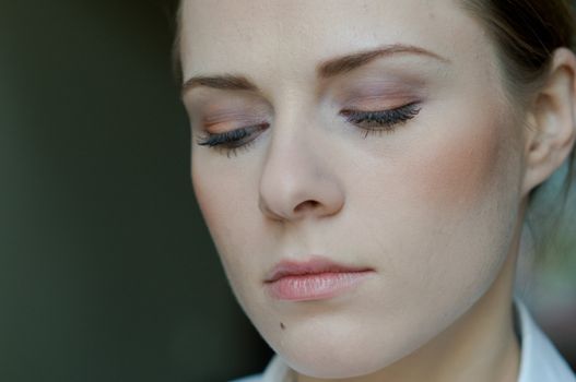 Pretty woman makeup series. Closeup on face.
